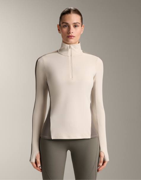 OYSHO – Thermo-Baselayer-T-Shirt in Hellrosa mit kurzem Reißverschluss - view 1