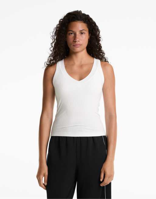 Oysho - Top senza maniche in misto modal bianco a righe