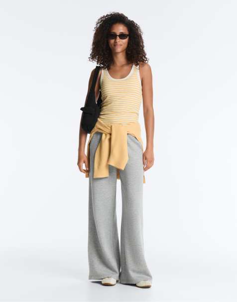 OYSHO - Top senza maniche lungo in modal giallo a coste con scollo rotondo - view 1