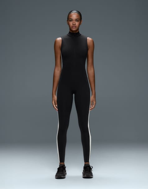 OYSHO tuta lunga compressiva color block nera - view 1