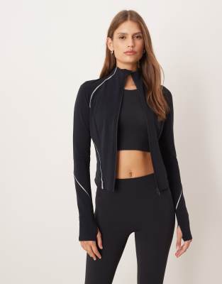 Oysho - Veste chaude et légère en tissu technique à détails réfléchissants - Noir