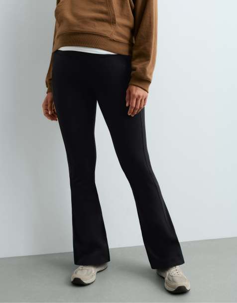 OYSHO Warm maternity flare trousers with zips in black - view 1