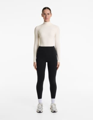 OYSHO - Warme knöchellange Leggings in Schwarz, 70 cm