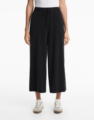 Oysho - Weiche Cropped-Hose aus Modalmix in Schwarz mit weitem Bein