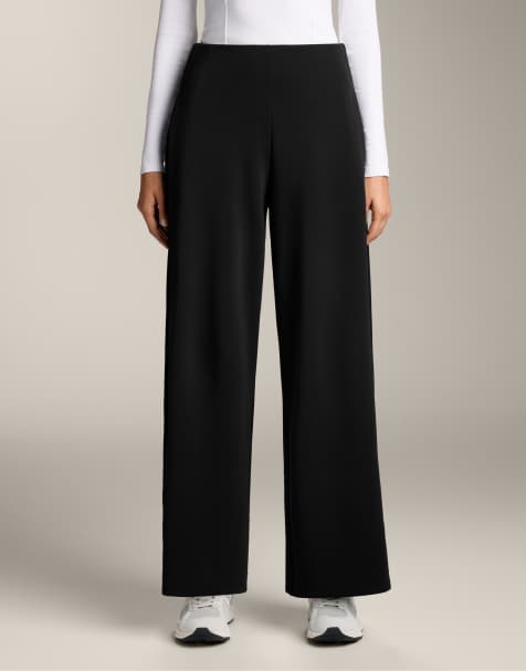 OYSHO Wide leg side-pleated trousers with soft-touch modal. in black - view 1