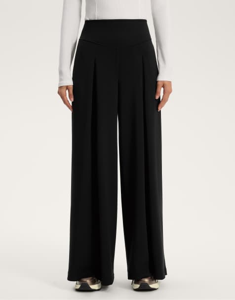 OYSHO Wide-leg trousers with front pleat and soft-touch modal in black - view 1