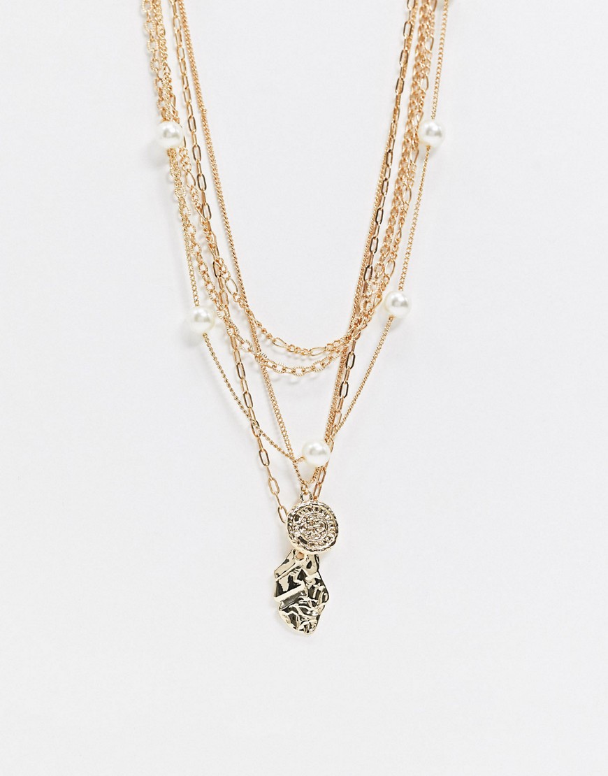 фото Ожерелье из золотистых цепочек в несколько рядов с подвесками pieces-золотой