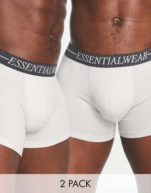 Pack de 2 calzoncillos en tonos beis con texto "Essential" en de ASOS | ASOS