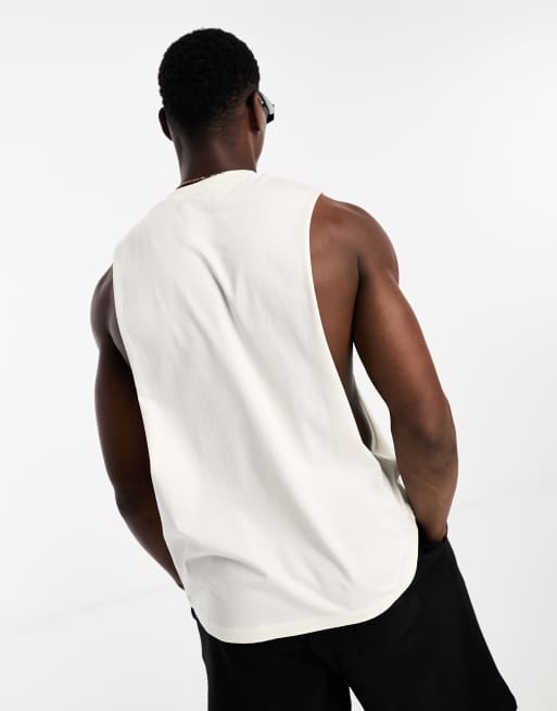 Pack de 2 camisetas de color crudo y burdeos holgadas sin mangas con sisas caídas de ASOS DESIGN, 2 de 4