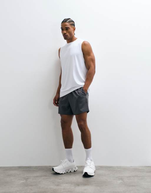 Pack de 2 camisetas deportivas de color negro y blanco sin mangas de malla de secado rápido Icon de 4505, 3 de 5