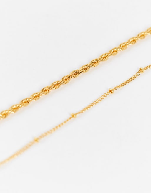 Pack de 2 collares chapados en oro de 14 quilates con colgantes de barra y de disco de ASOS DESIGN, 2 de 4