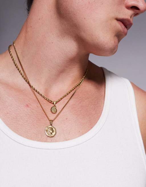 Pack de 2 collares dorados con colgantes en forma de concha de acero inoxidable resistente al agua de ASOS DESIGN