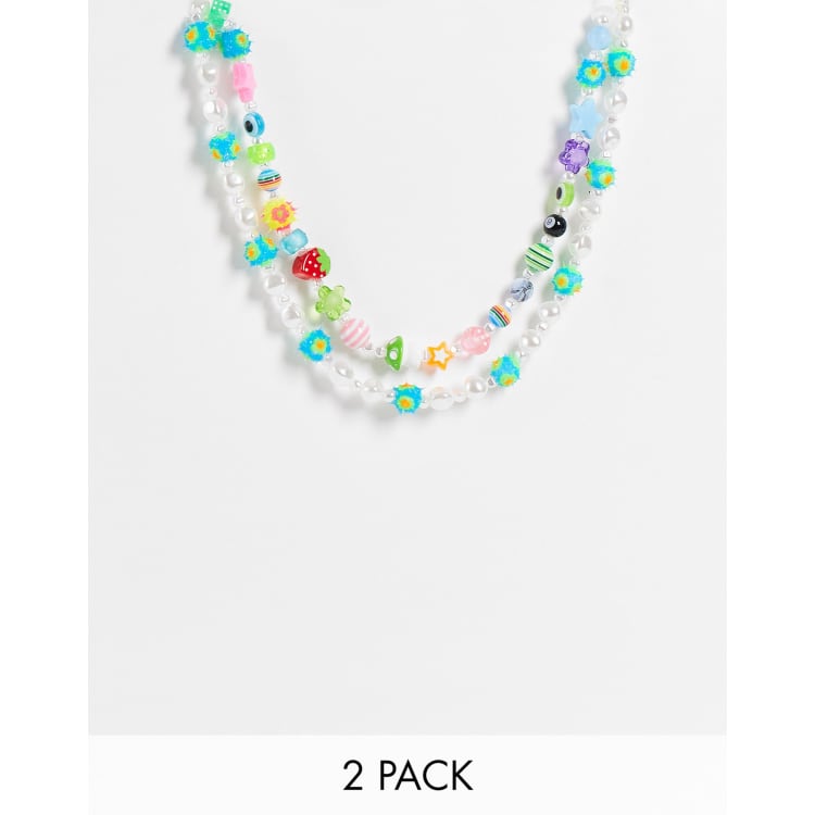 Pack de 2 collares multicolores con y puntiagudas de ASOS DESIGN | ASOS