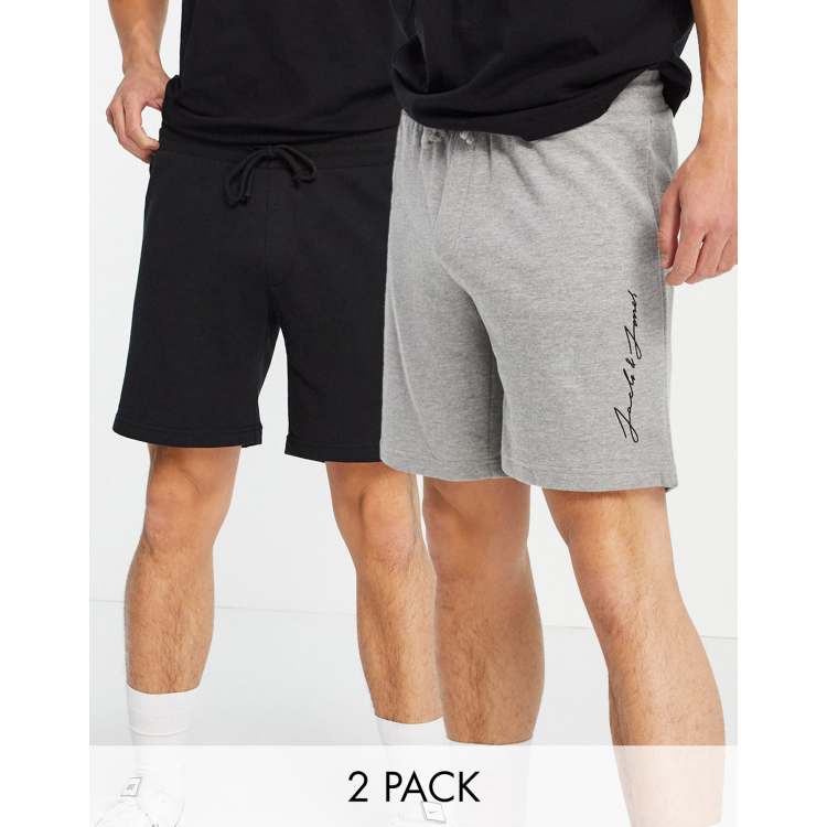 Pack de 2 pantalones cortos de color negro y gris con logo de texto lateral de Jack Jones Intelligence | ASOS
