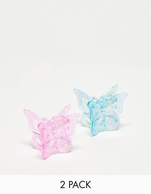 Pack de 2 pinzas para el cabello de color rosa y azul iridiscentes con forma de mariposa de DesignB London 