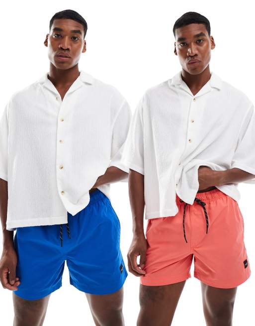 Pack de 2 shorts de baño de color rosa y azul de Jack & Jones