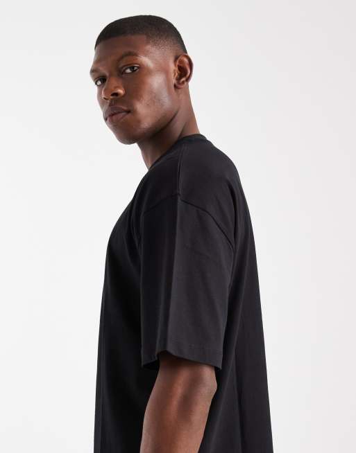Pack de 2 camisetas de color blanco y negro extragrandes Essentials de ASOS DESIGN, 4 de 5