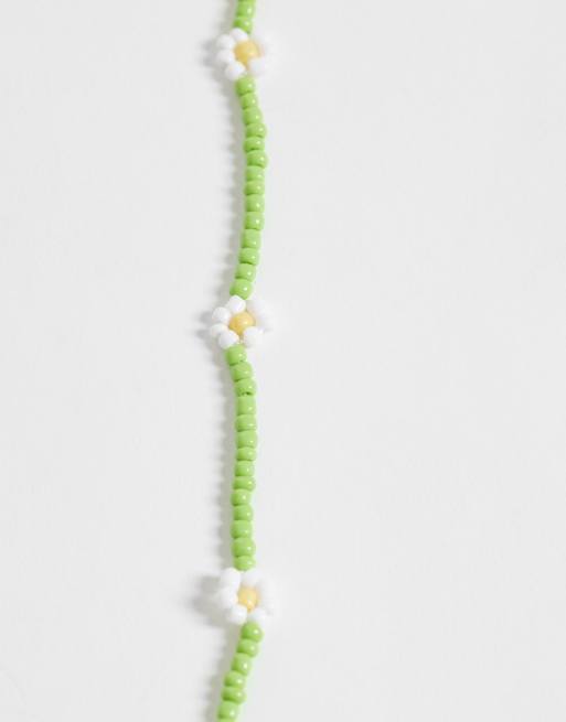 Pack de 2 collares verdes de cuentas con diseño de margaritas de ONLY, 4 de 4