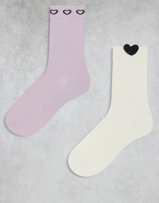 Pack de 2 pares de calcetines de color blanco hueso y rosa de caña alta con detalle de corazones de Monki