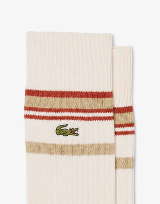Pack de 2 pares de calcetines de tubo de color beis y blanco con detalle de rayas de Lacoste, 2 de 3