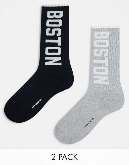 Pack de 2 pares de calcetines deportivos de color negro y gris con logo de New Balance