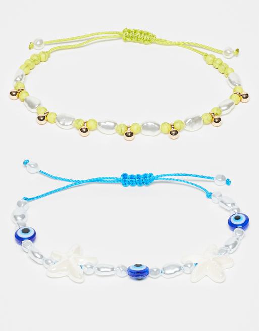 Pack de 2 pulseras de color azul y verde con cuentas y charms de ASOS DESIGN