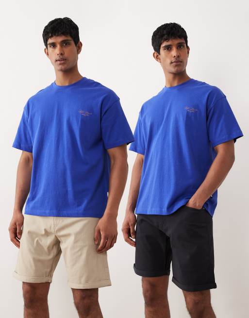 Pack de 2 shorts de baño de color beis y negro con bajos vueltos de Jack & Jones