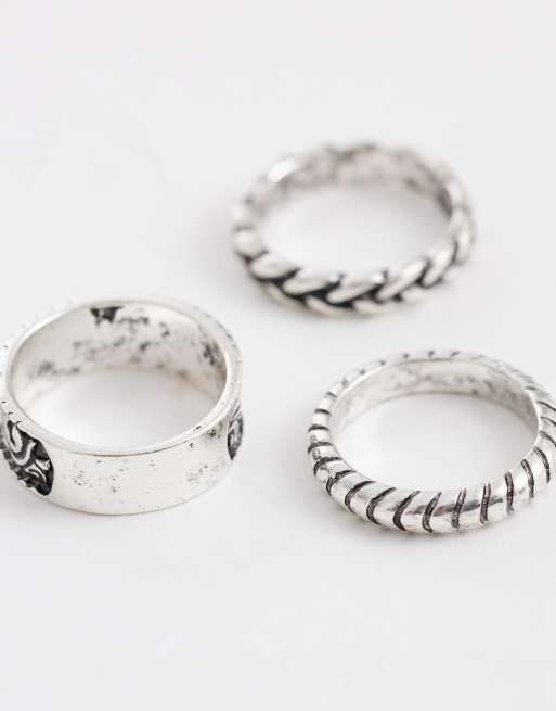 Pack de 3 anillos plateados de banda con diseños texturizados y decorativos de ASOS DESIGN, 2 de 3