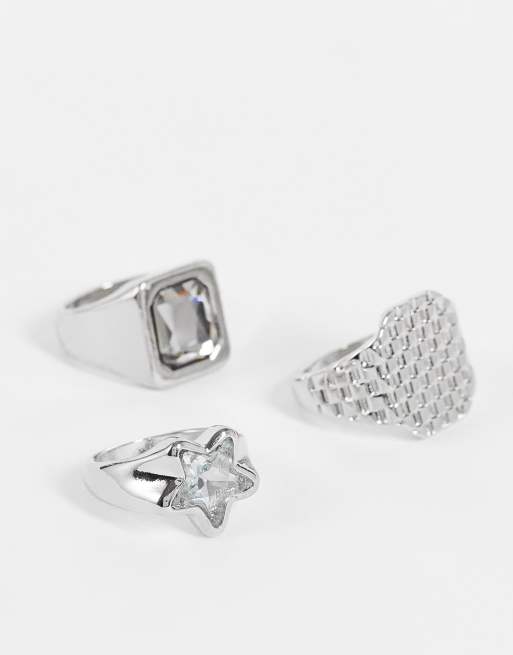 Pack de 3 anillos tipo sello en tono plateado con diseño de estrella de pedrería de ASOS DESIGN