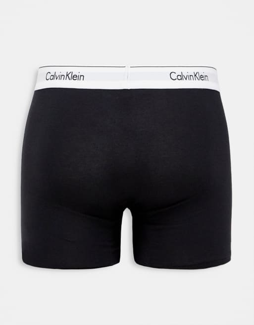 Pack de 3 calzoncillos bóxer de color negro, caqui y crema de Calvin Klein, 2 de 4