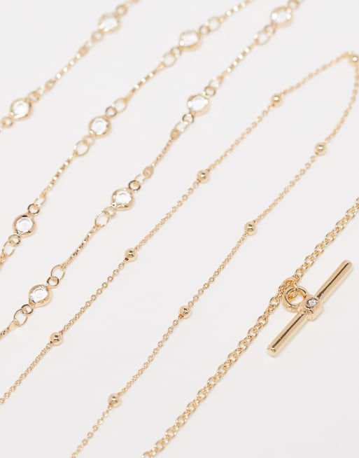Pack de 3 collares dorados con barra en forma de T y detalle de estrella de ASOS DESIGN, 2 de 3