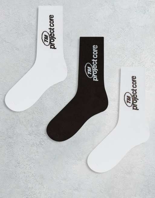 Pack de 3 pares de calcetines deportivos de color marrón blanco y crema con texto lateral de Jack & Jones