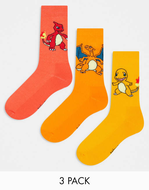 Pack de 3 pares de calcetines deportivos naranjas de Pokémon con diseño de Charmander evolucionando de ASOS DESIGN