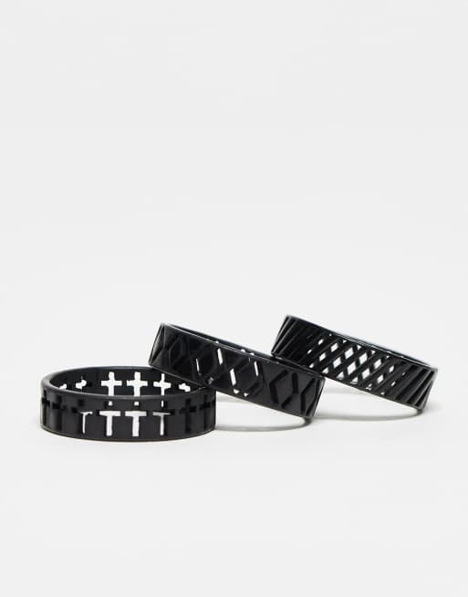 Pack de 3 anillos en tono negro mate con diseños calados y de cruces de ASOS DESIGN, 3 de 4