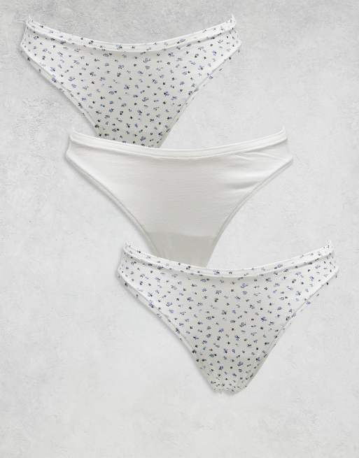 Pack de 3 braguitas brasileñas de color blanco y estampado de florecitas de algodón con ribete de encaje de Lindex 