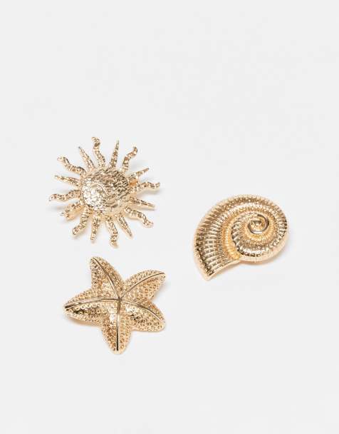 Pack de 3 broches dorados con diseños de sol, concha y estrella de mar de ASOS DESIGN - view 1
