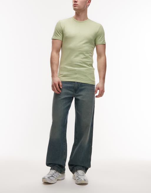 Pack de 3 camisetas de estar por casa de color negro, verde y verde claro de Lacoste, 3 de 5