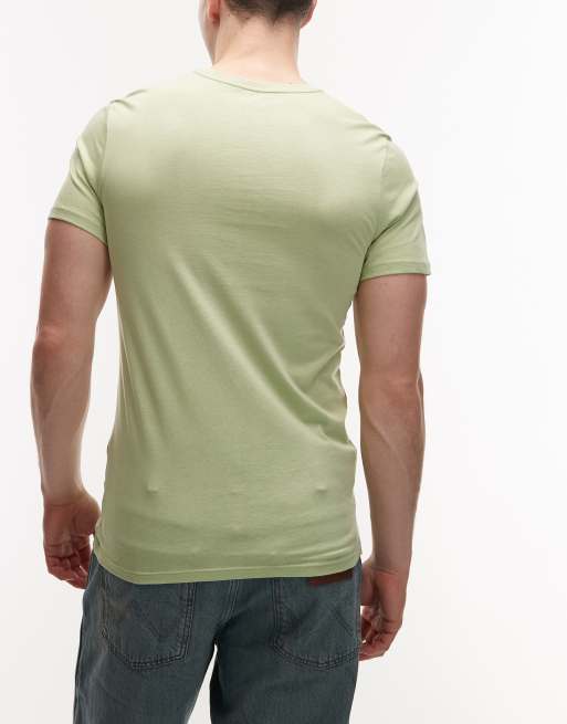 Pack de 3 camisetas de estar por casa de color negro, verde y verde claro de Lacoste, 5 de 5