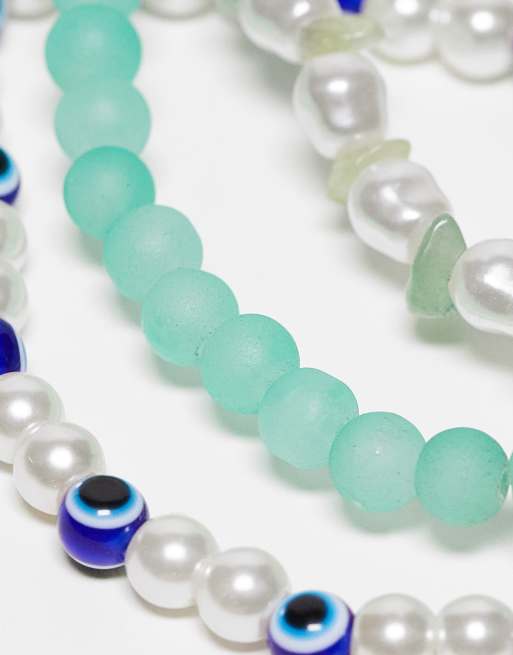 Pack de 3 pulseras con diseños en azul, verde y de ojo turco de perlas sintéticas y cuentas de ASOS DESIGN , 2 de 4