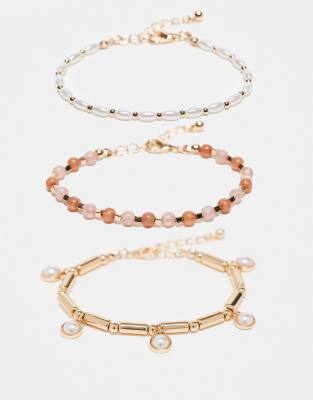 Pack de 3 pulseras doradas con diseño trenzado y detalle de charms de perlas de imitación de ASOS DESIGN - view 1