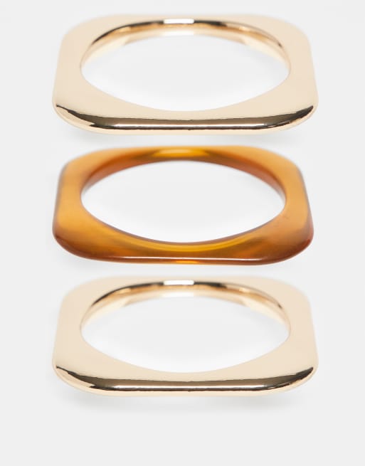 Pack de 3 pulseras rígidas de color dorado y de resina de ASOS DESIGN