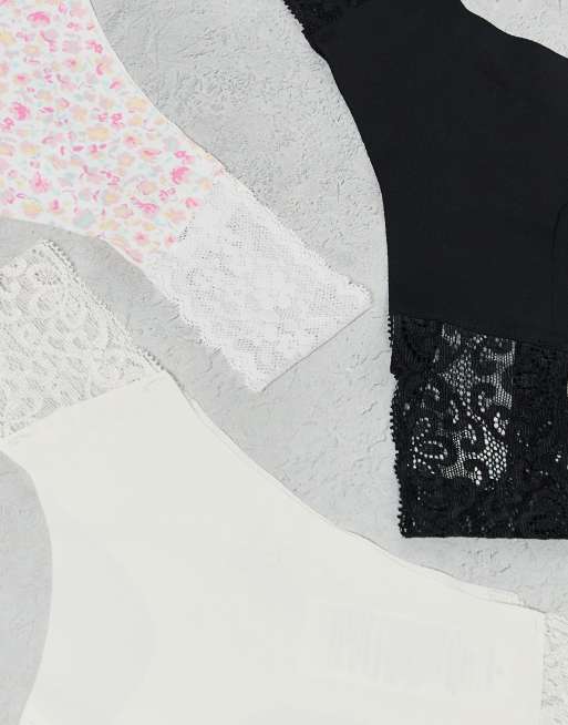 Pack de 3 tangas de color negro, blanco y estampado de orquídeas sin costuras de Cotton On, 2 de 3