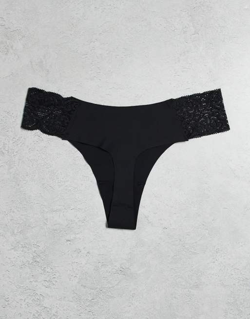 Pack de 3 tangas de color negro, blanco y estampado de orquídeas sin costuras de Cotton On, 3 de 3