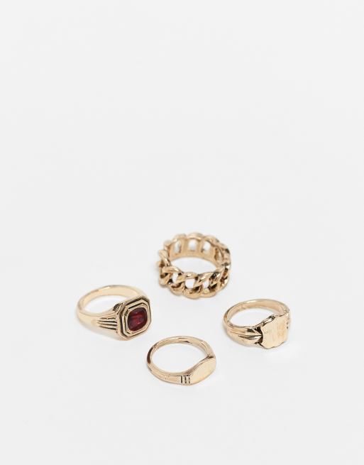 Pack de 4 anillos tipo sello en tono dorado antiguo de ASOS DESIGN