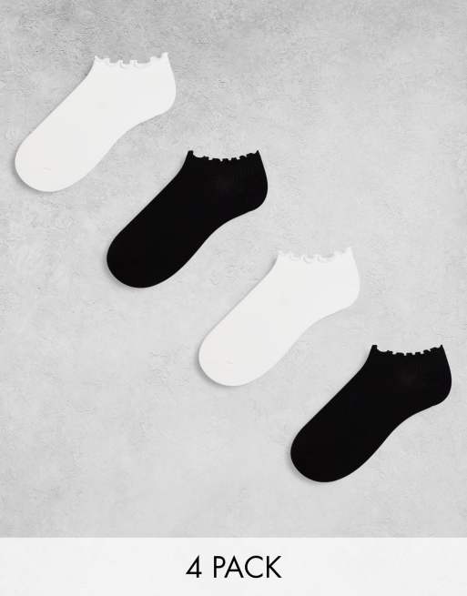 Pack de 4 pares de calcetines de color negro y blanco para zapatillas de deporte con bordes ondulados de Lindex