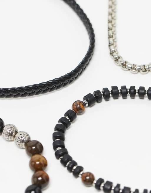 Pack de 4 pulseras negras para festivales de cadena y cuentas de ASOS DESIGN  , 2 de 3