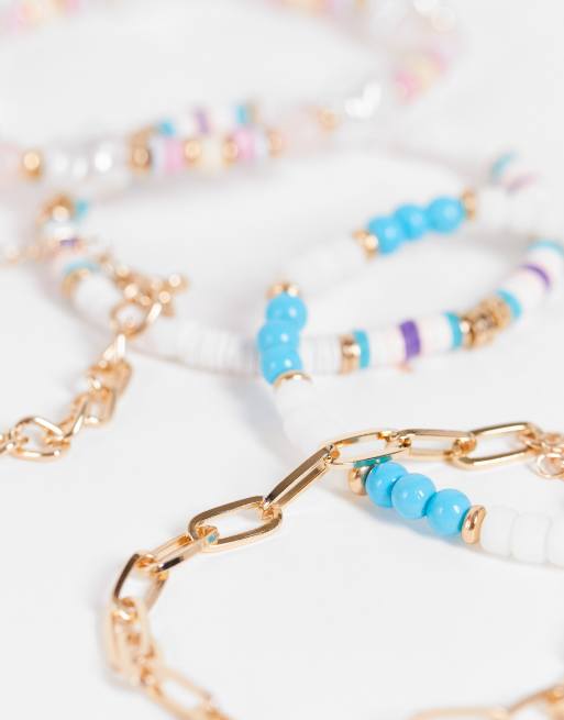 Pack de 5 pulseras con diseño de cadena de cadena y cuentas de colores pastel variados de ASOS DESIGN, 2 de 4