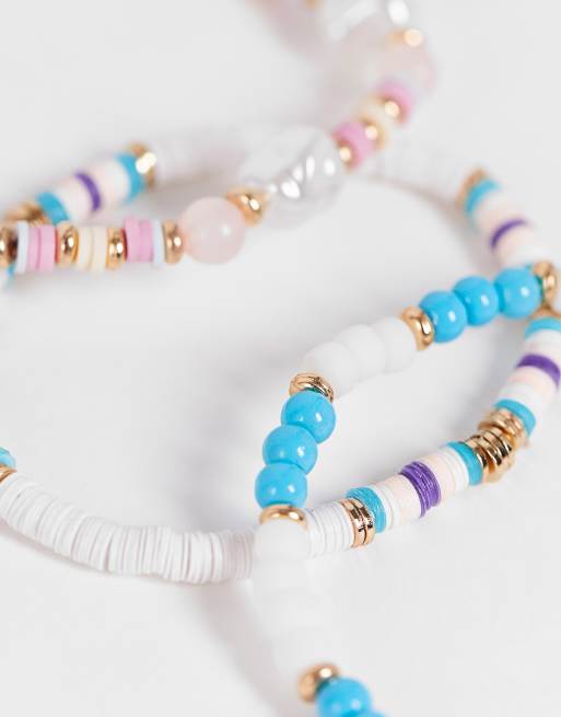 Pack de 5 pulseras con diseño de cadena de cadena y cuentas de colores pastel variados de ASOS DESIGN, 3 de 4