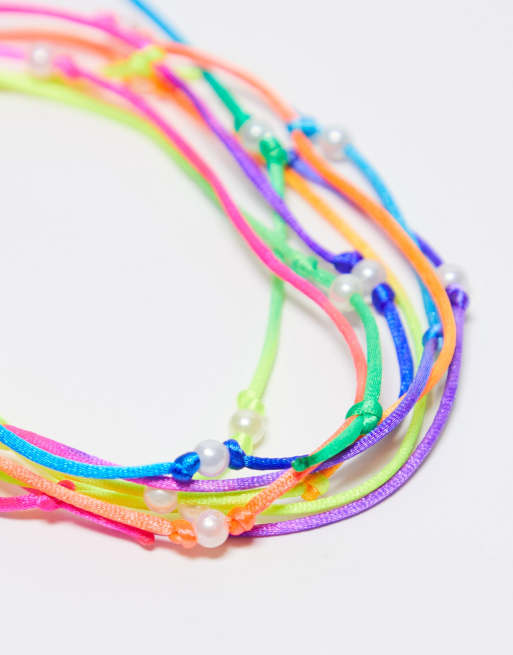 Pack de 5 pulseras de cuerda multicolores con charms de perlas de ASOS DESIGN   , 3 de 4