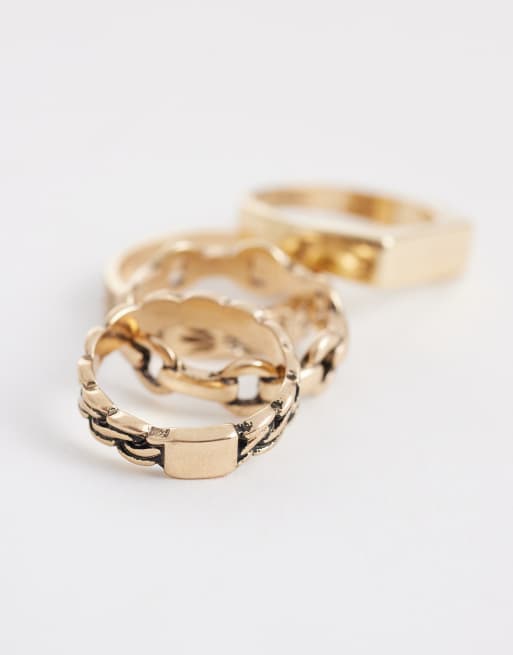 Pack de 7 anillos dorados con diseño de cadena y banda de ASOS DESIGN, 2 de 3